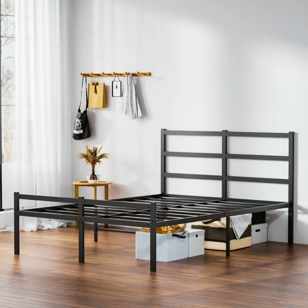 How to Stop a Metal Bed Frame from Squeaking Modern black metal bed frame with a simple headboard and slatted foundation in a minimalist bedroom with wooden floors.